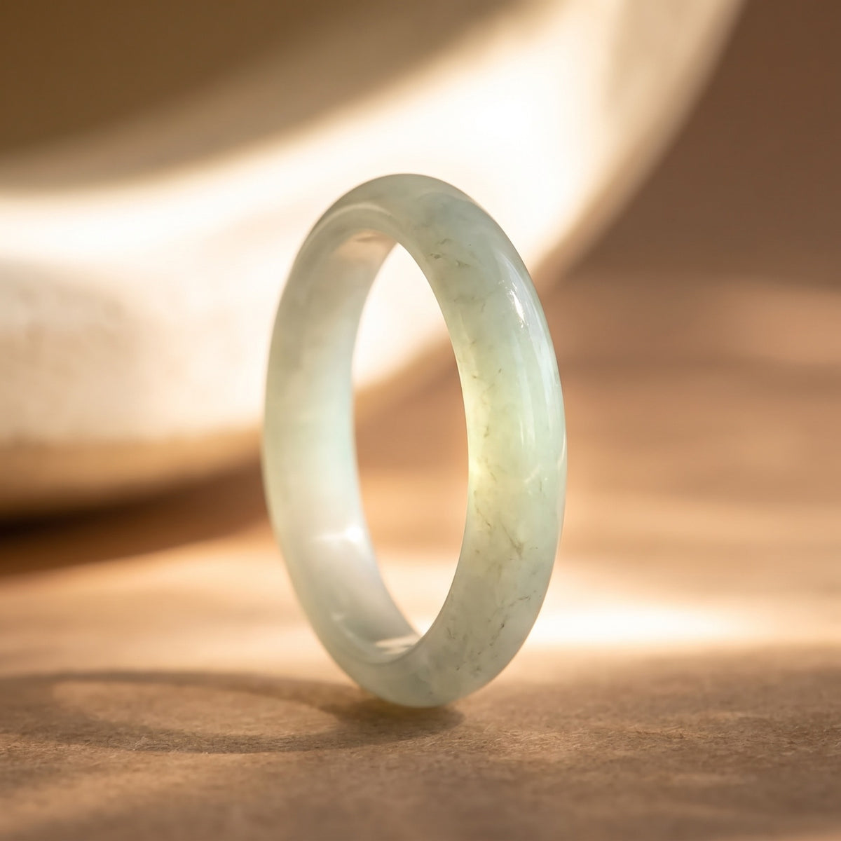 Jade Stacking Ring – backlit macro showing the natural jade's translucency and fine veining