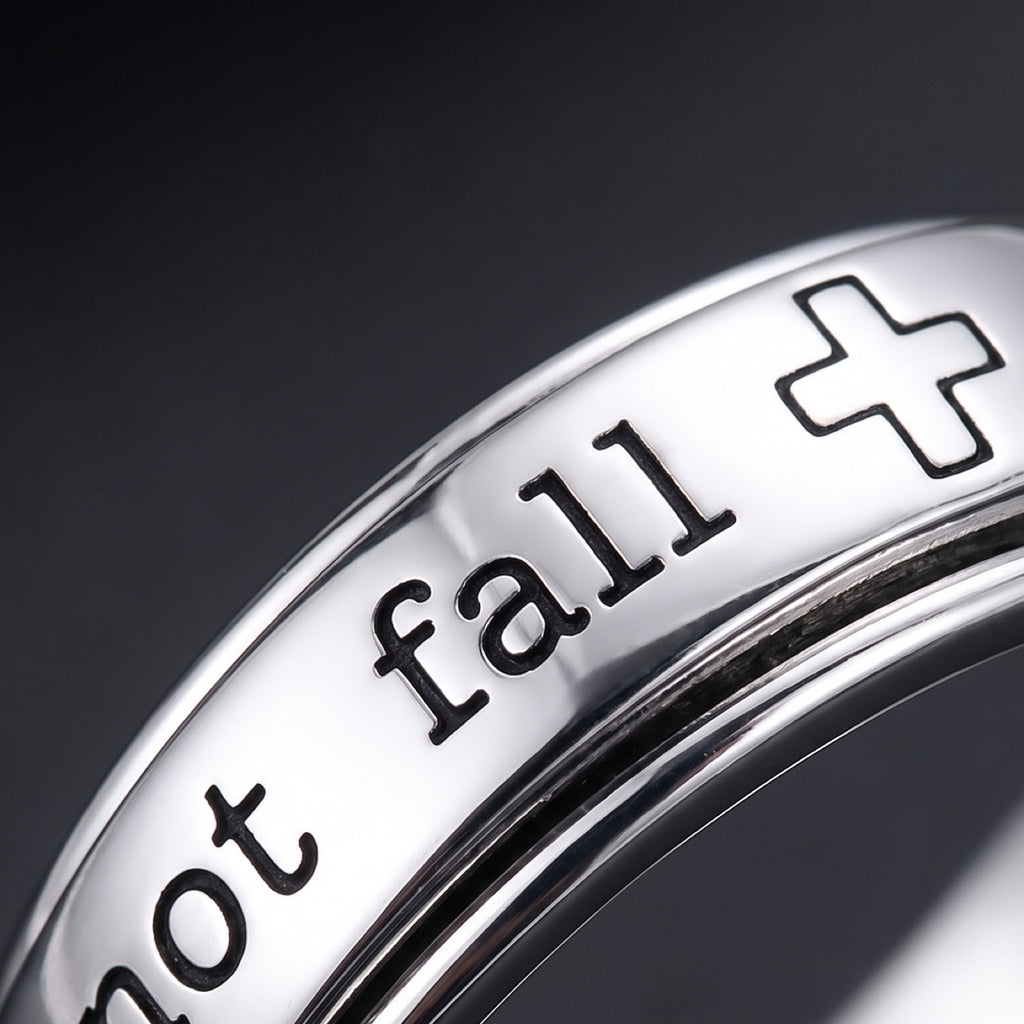 Psalm 46:5 Spinner Ring – close-up of the engraved words "not fall" and the cross