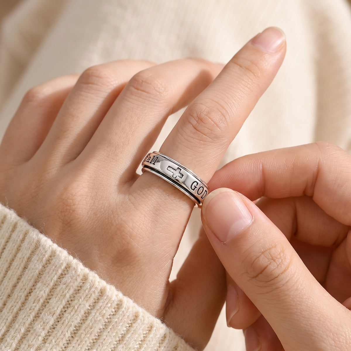 Psalm 46:5 Spinner Ring – fingers turning the 360° rotating outer band to fidget and calm